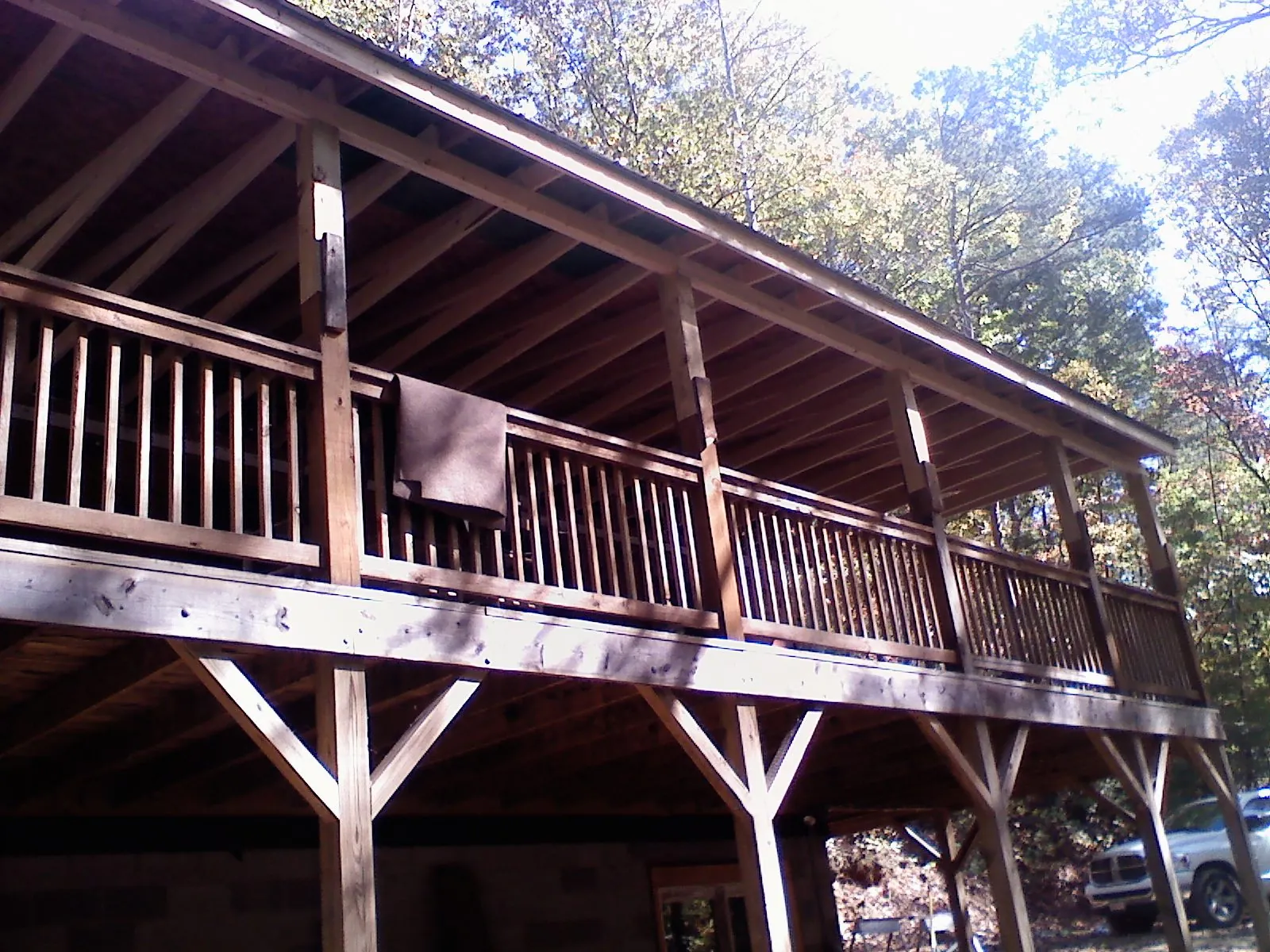 Timber framing under a new elevated porch and deck — Roof Leak Repair in East Liberty by Roofing Brothers
